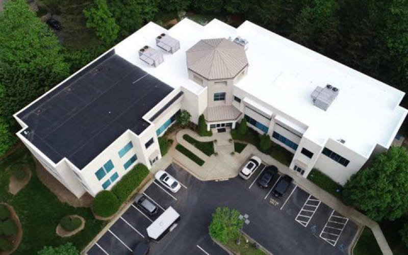 An aerial view of a commercial office building.