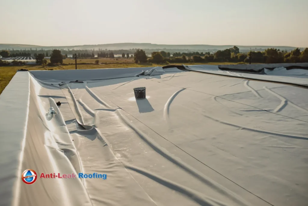 A white tarp on a roof.